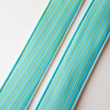 Vintage guitar strap made with 70s blue and yellow striped polyester by Original Fuzz.