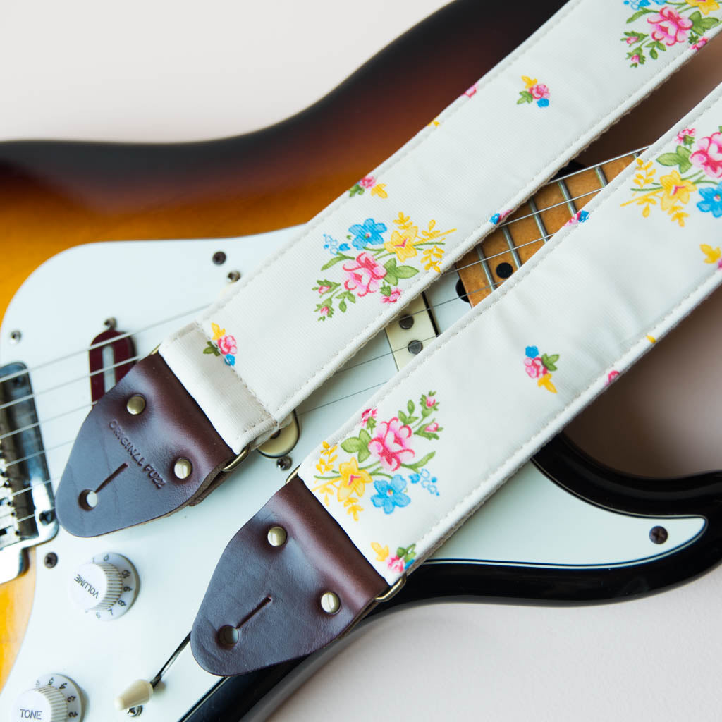 Reclaimed vintage guitar strap in 70s cream polyester with floral design made by Original Fuzz.