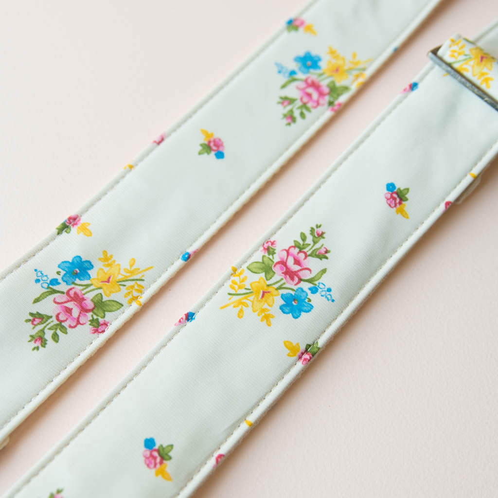 Reclaimed vintage guitar strap in 70s cream polyester with floral design made by Original Fuzz.