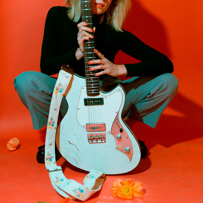 Reclaimed vintage guitar strap in 70s cream polyester with floral design made by Original Fuzz.
