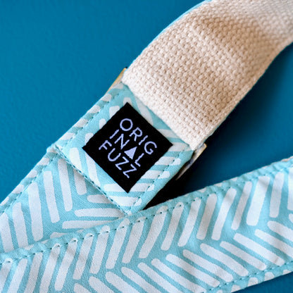 Light blue silkscreened guitar strap handmade in Nashville by Original Fuzz.