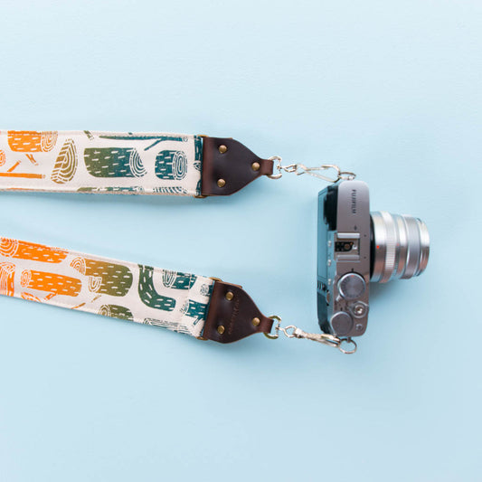 tree stumps silkscreen vintage style camera strap by original fuzz and grand palace 