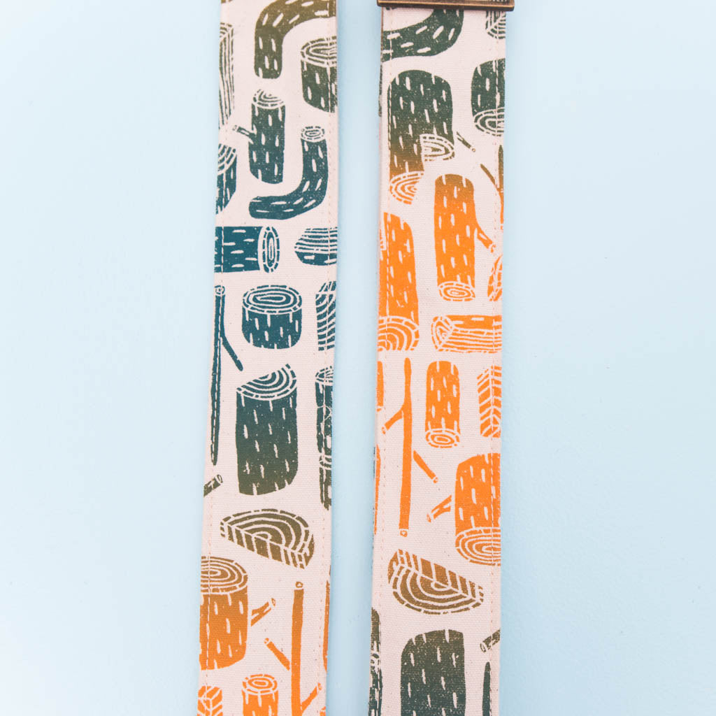 tree stumps silkscreen vintage style camera strap by original fuzz and grand palace