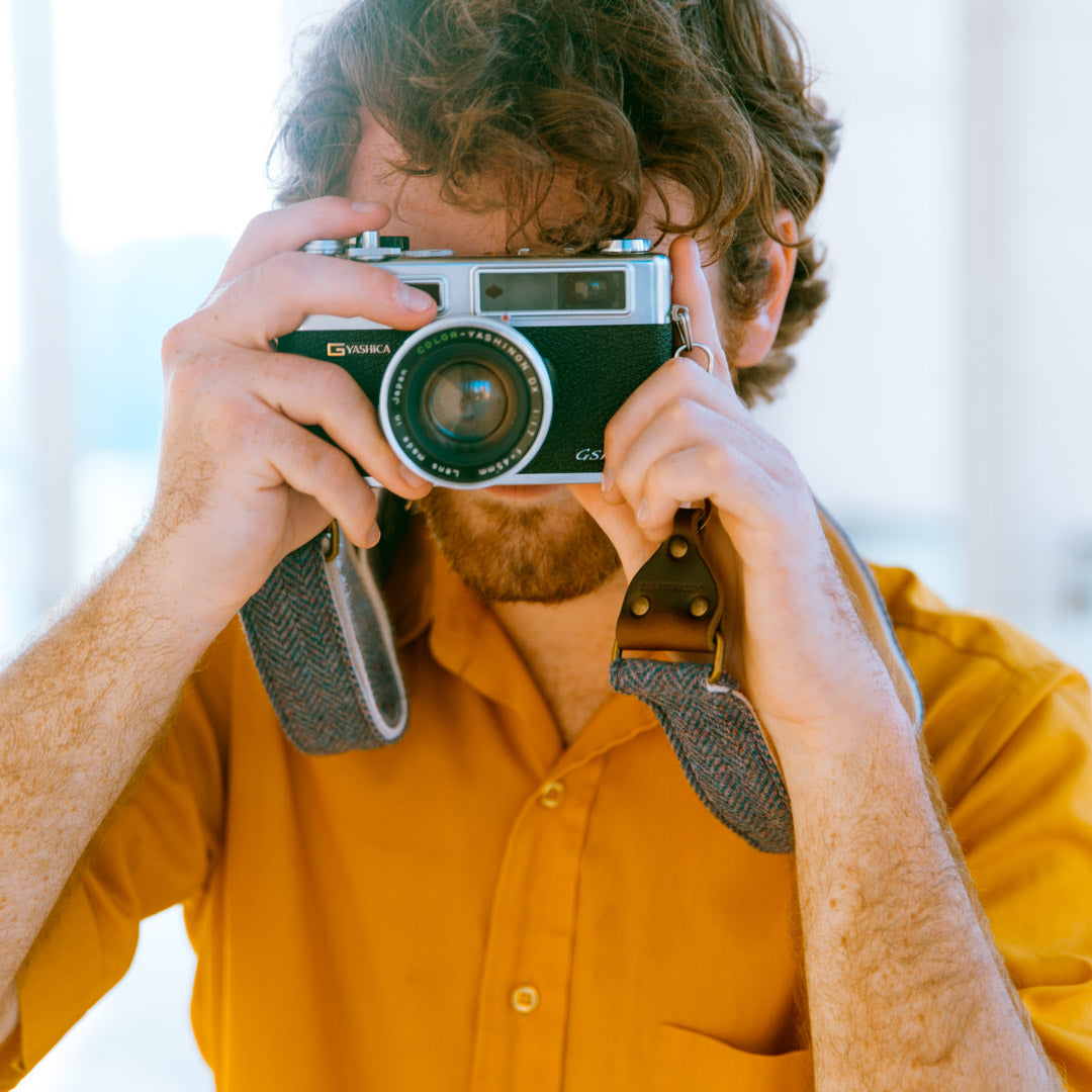 Blue wool herringbone skinny vintage-style camera strap made by Original Fuzz in Nashville. 