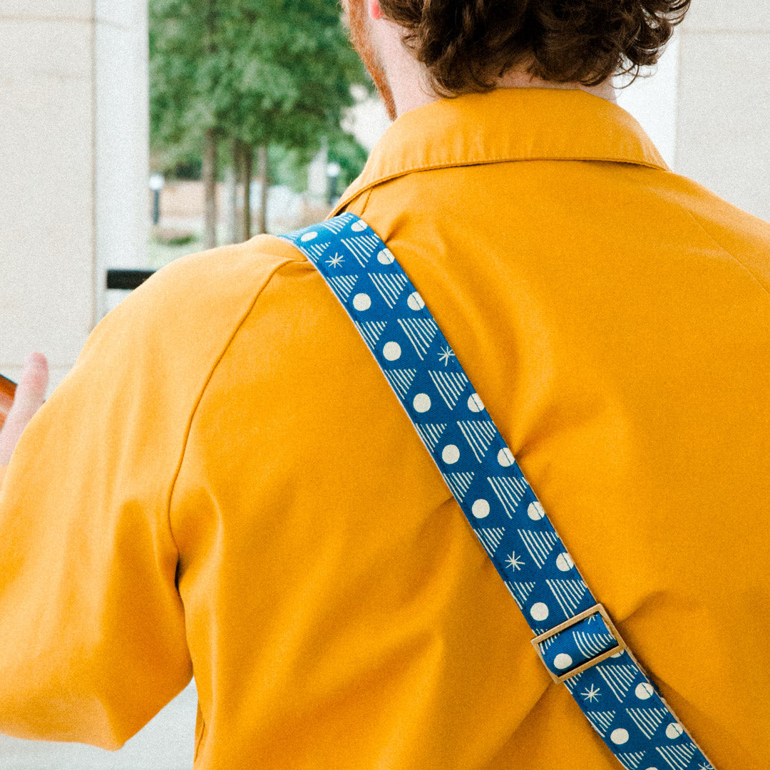 Real Estate's bassist Alex Bleeker designed this skinny guitar strap for Original Fuzz made with blue cotton and silkscreened by Grand Palace with white ink in Nashville, TN. 