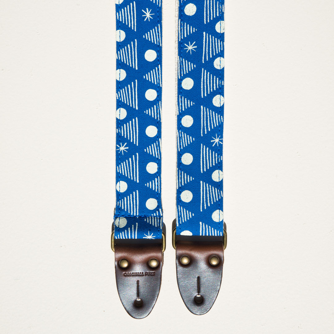 Real Estate's bassist Alex Bleeker designed this skinny guitar strap for Original Fuzz made with blue cotton and silkscreened by Grand Palace with white ink in Nashville, TN. 