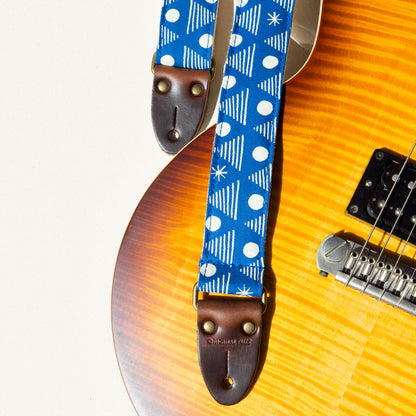 Real Estate's bassist Alex Bleeker designed this skinny guitar strap for Original Fuzz made with blue cotton and silkscreened by Grand Palace with white ink in Nashville, TN. 