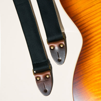 Solid black cotton canvas skinny guitar strap made by Original Fuzz in Nashville. 