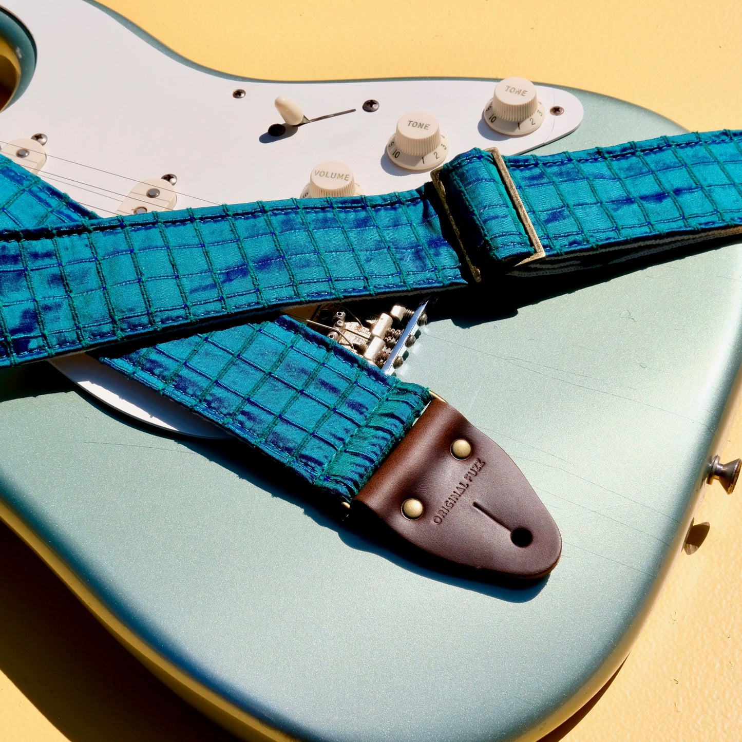 Teal Dupioni silk guitar strap designed by The Minks and made by Original Fuzz in Nashville.