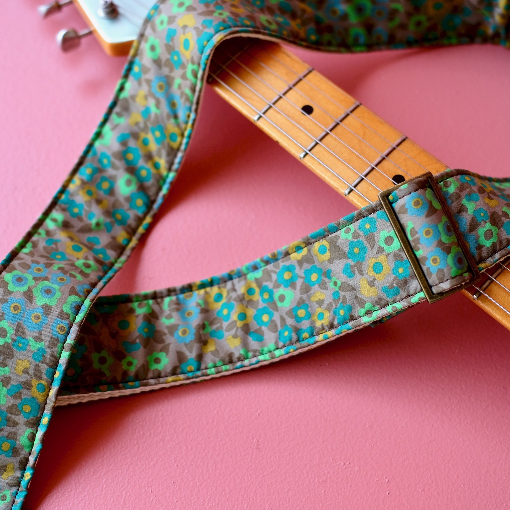 Green floral Italian silk guitar strap handmade in Nashville by Original Fuzz.