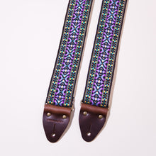 Detail of the Vintage Depot Street Guitar strap with purple hootenanny jacquard 