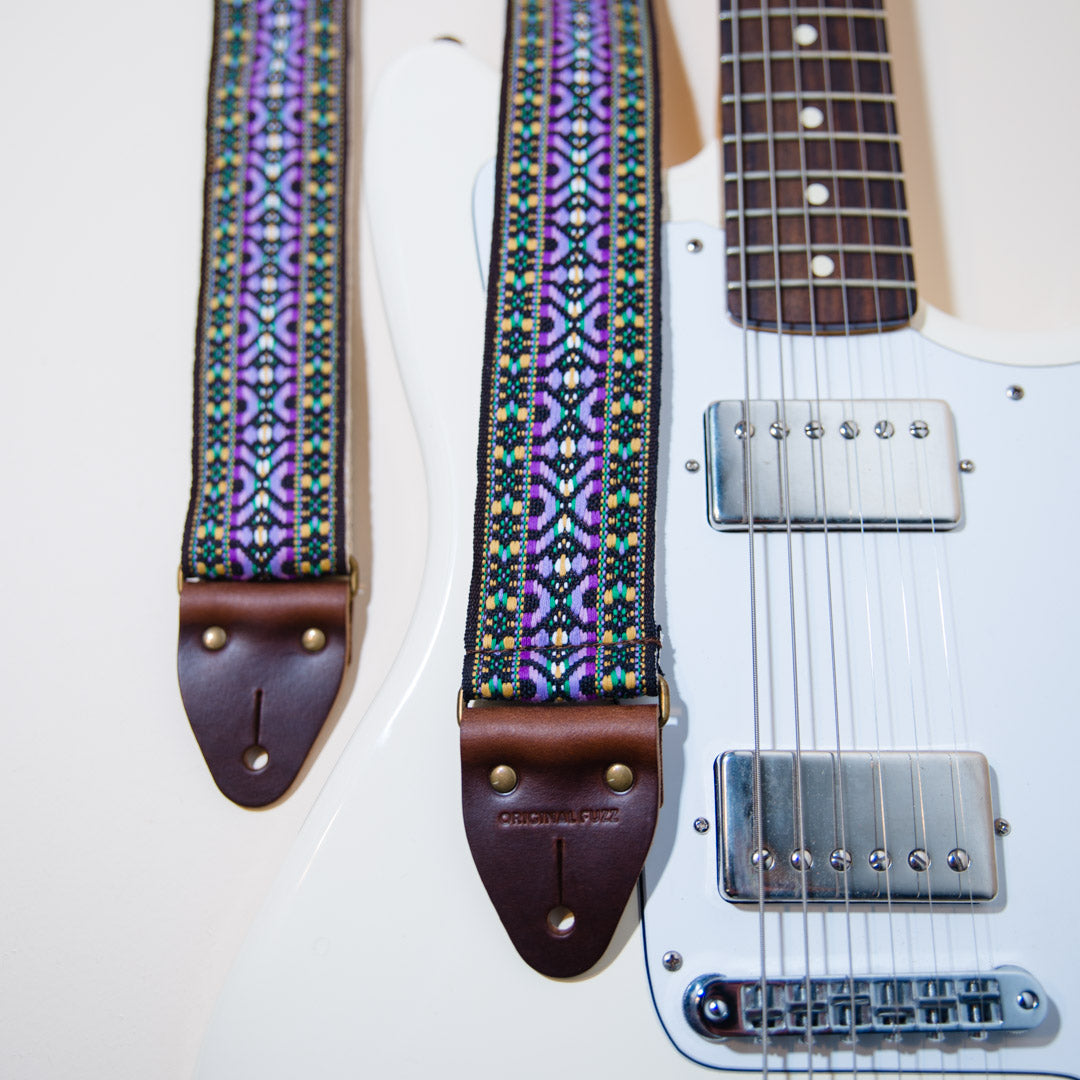 The vintage guitar strap in Depot Street with a Fender Jaguar