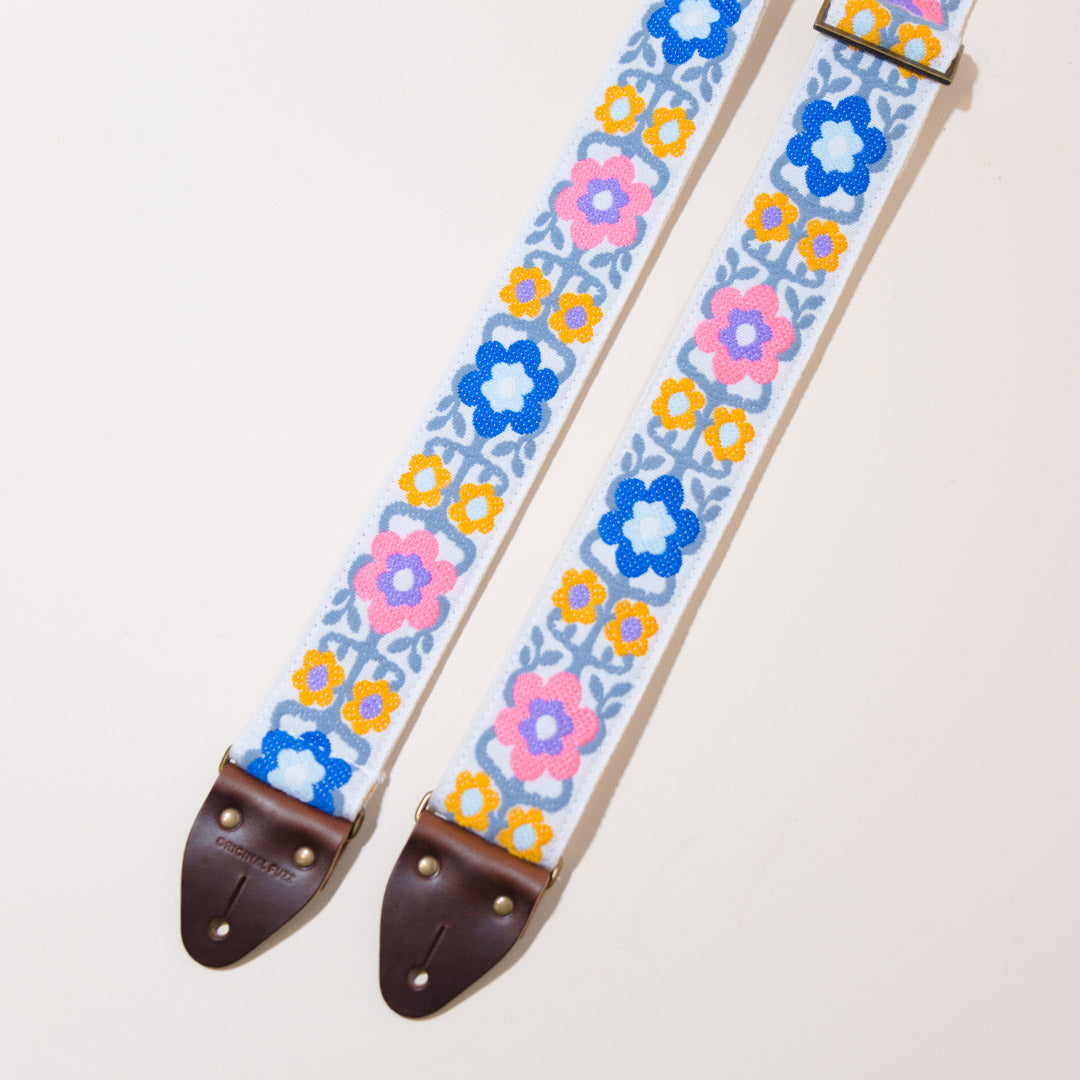 Detail of the vintage-style hardware and brown horween leather used in the vintage guitar strap in Fryemont Street