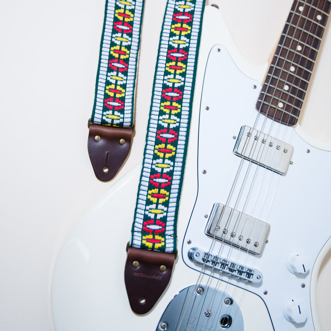 Another view of the Vintage Guitar Strap in Rhododendron Ave shows the vintage-style antique brass hardware