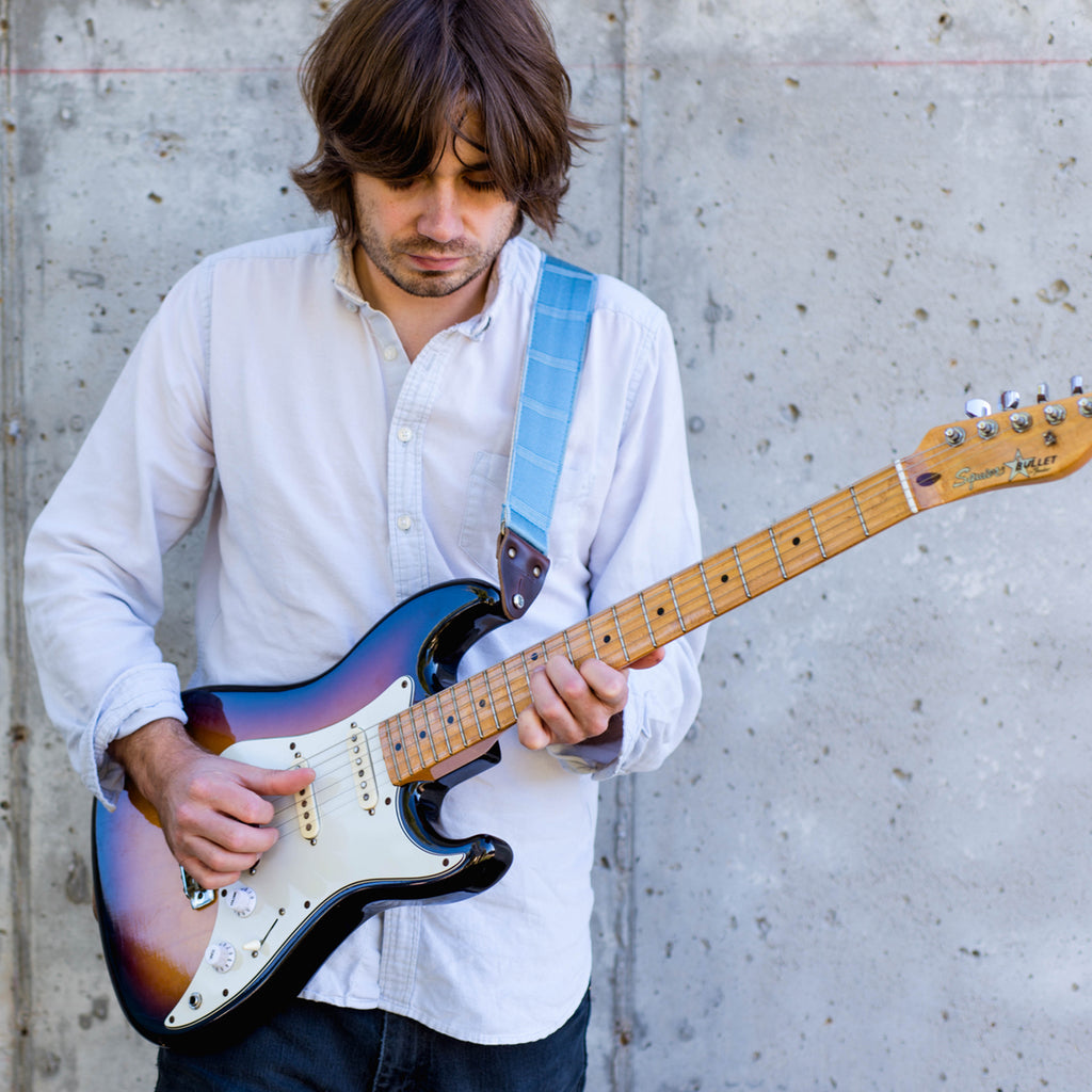 Vintage blue silk guitar strap made by Original Fuzz in Nashville, TN. 