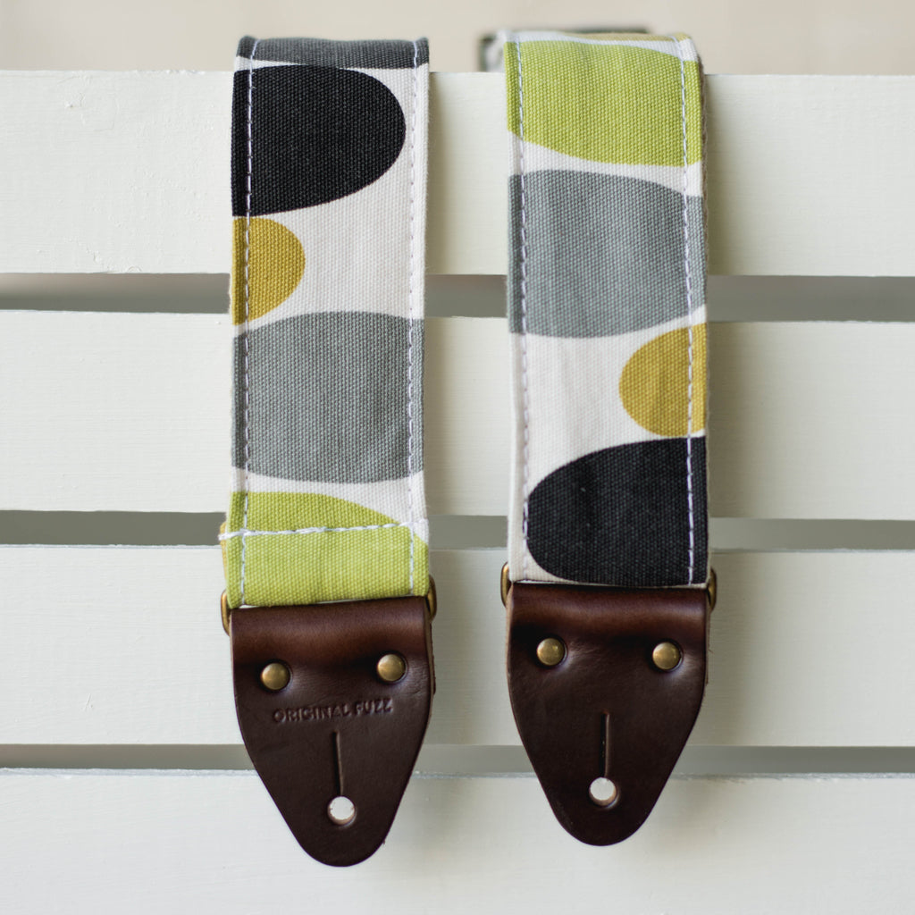 Vintage guitar strap with a retro lime green and black circle design made by Original Fuzz in Nashville, TN. 
