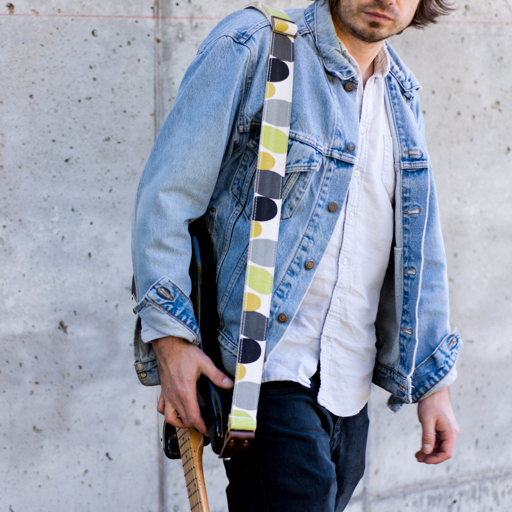 Vintage guitar strap with a retro lime green and black circle design made by Original Fuzz in Nashville, TN. 