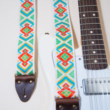 The vintage guitar strap in Town Mountain Road features a gorgeous geometric jacquard weave